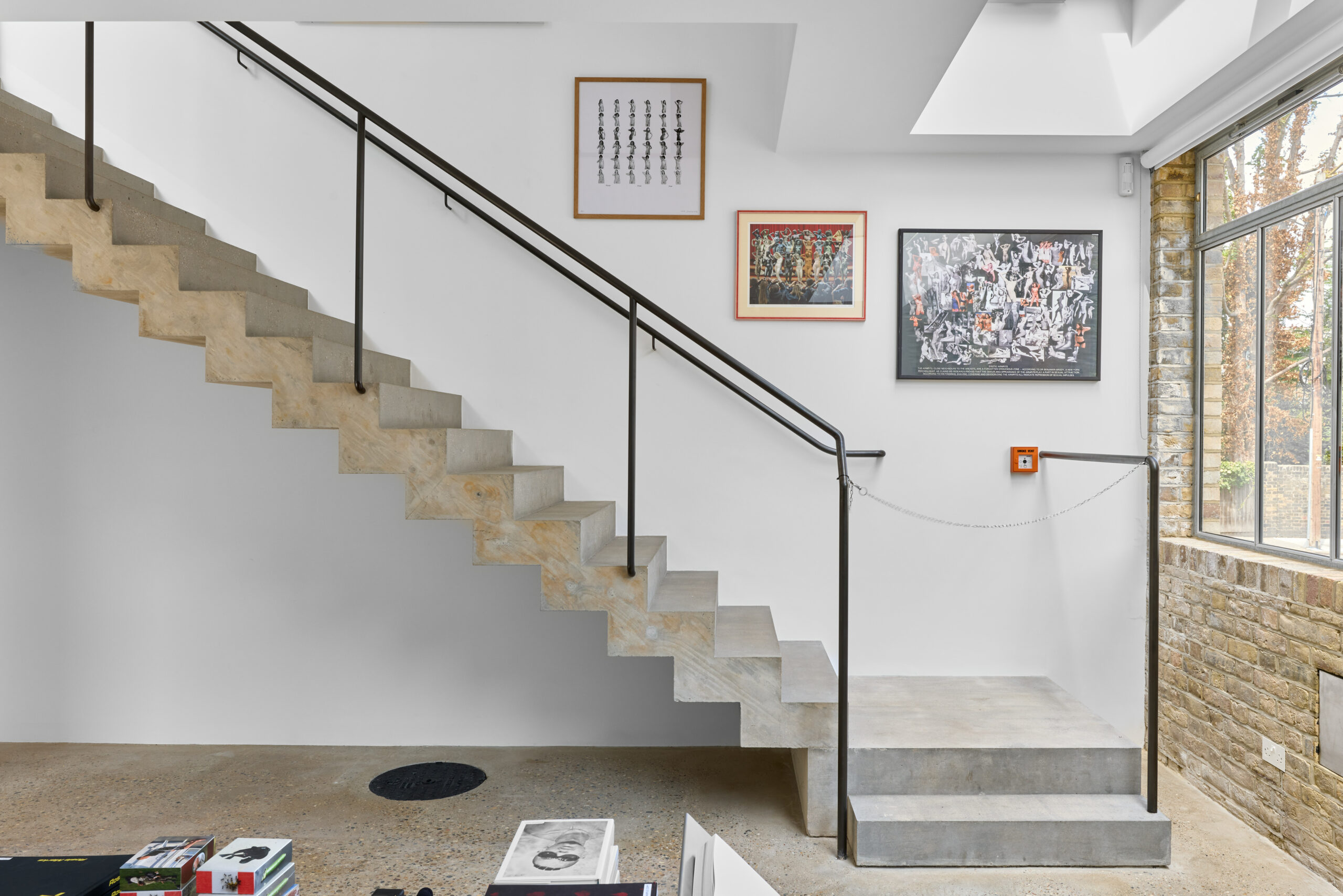 Staircase and bespoke hand rail of the shop at Graces Mews Gallery, Camberwell.